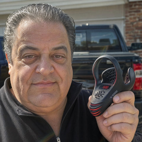 PrimePulse customer holding the device