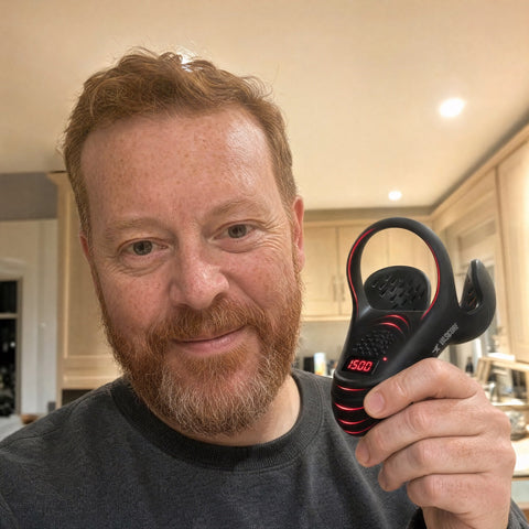 PrimePulse customer holding the device